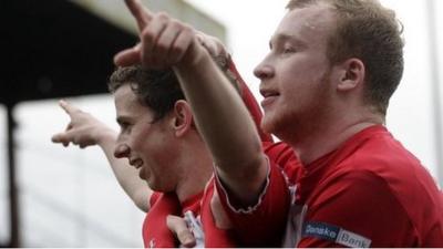 Cliftonville's Eamonn Seydak and Liam Boyce celebrate the victory over Kilmore in the Irish Cup