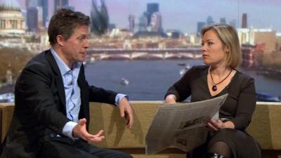 Hugh Grant and Gillian Tett