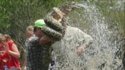 Tommy Owen wrestles 10ft python