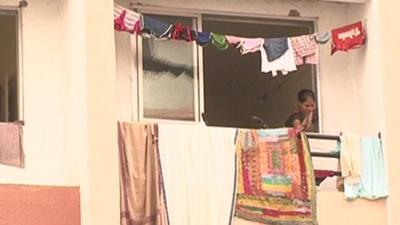 Woman on balcony in India