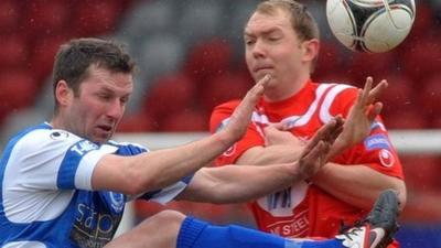 Match action from Portadown against Dungannon at Shamrock Park