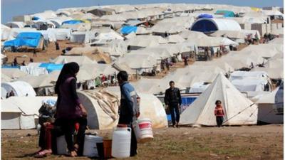 Refugees in Atmeh camp, in Idlib, northern Syria