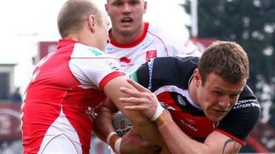 St Helens' Josh Jones tackled by Hull KR's Michael Dobson