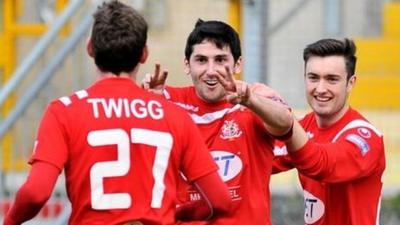 Portadown's Gary Twigg celebrates with goalscorer Sean Mackle