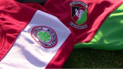 Cliftonville and Glentoran shirts