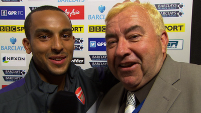 Arsenal's Theo Walcott and BBC commentator Jonathan Pearce