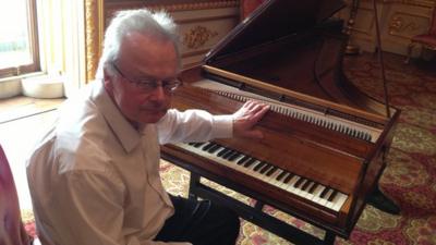 Pianist and composer Professor David Owen Norris with the oldest surviving grand piano in Britain