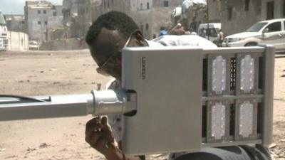 Man installing street light