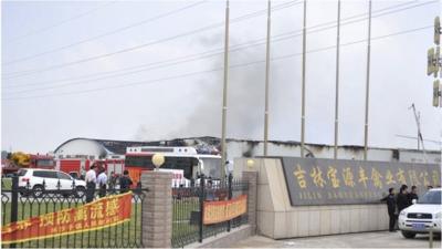 Smoke rises from a poultry farm at the Jilin Baoyuanfeng Poultry Company in Mishazi.