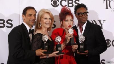 Hal Luftig, Daryl Roth, Cyndi Lauper and Billy Porter pose with four Tony awards