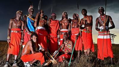 The Maasai Warriors cricket team pose with their bats