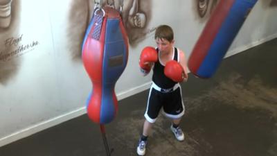 Young boy boxing