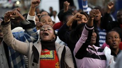 A group of Pretoria residents sing for Nelson Mandela