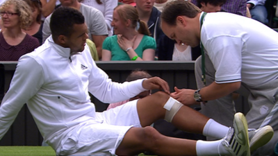 Tsonga receiving treatment