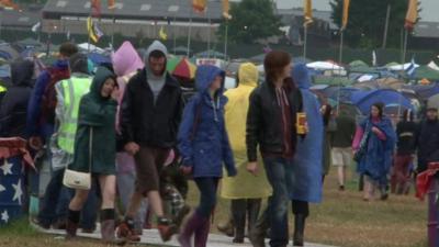 People at festival in raincoats