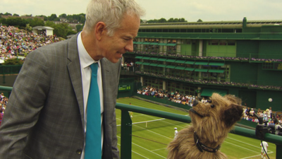 John McEnroe (left) & Hacker the Dog