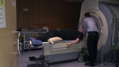 Ken Macdonald going into the MRI scanner