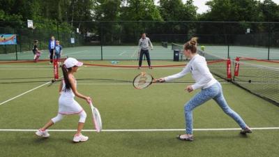 Children playing tennis