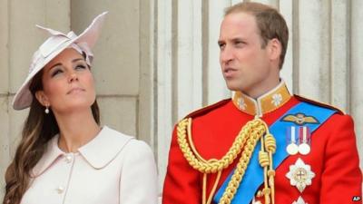 The Duchess and Duke of Cambridge stand on the balcony at Buckingham Palace during the Trooping the Colour parade 2013