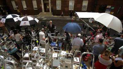 The world's media wait in the press pen opposite the Lindo Wing of St Mary's Hospital in central London