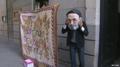A Spanish protestor dressed as Mariano Rajoy