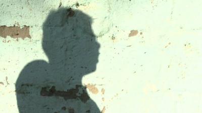 Shadow of a Christian man