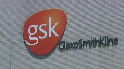 GSK logo on the side of a building