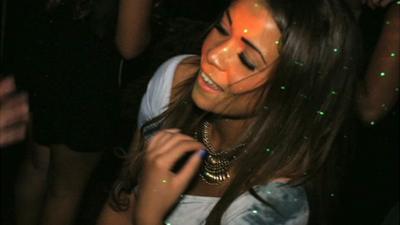 A young woman dancing in London