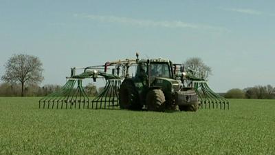 Fertilizer tractor in field