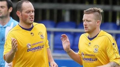 James Costello celebrates with goalscorer Matt Hazley