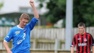 Andy Crawford celebrates scoring the winner against Crusaders