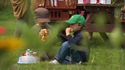 Children enjoying a free picnic