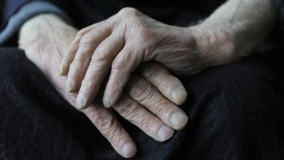 Hands of elderly man with dementia