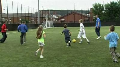 Children playing football