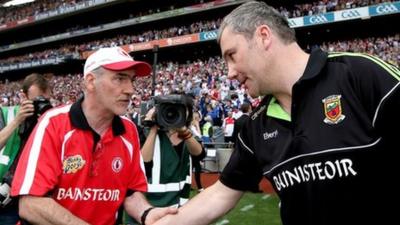 Tyrone's Mickey Harte congratulates James Horan at the end of the All Ireland semi-final