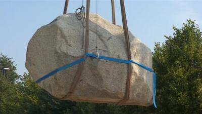 One part of the Two Stones artwork is winched into place in Maidstone