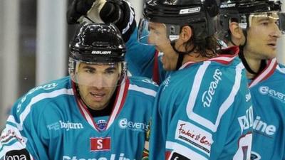 Calvin Elfring celebrates scoring a winning overtime goal against Bolzano Foxes