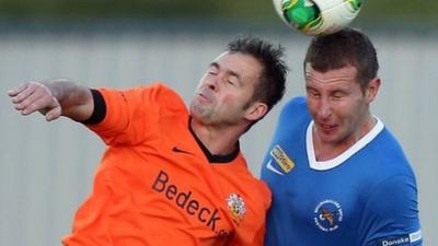 Match action from Ballinamallard against Glenavon