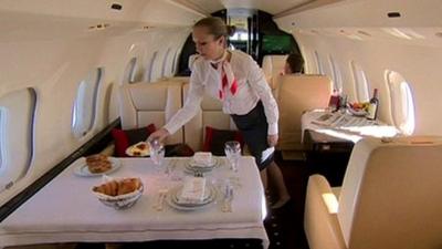 Cabin crew in private jet