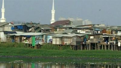 Slums on the edge of Jakarta's biggest dam.