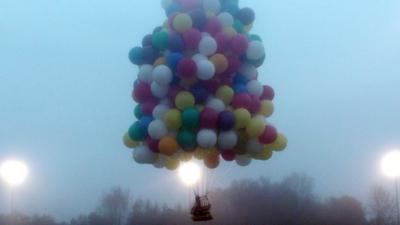 Jonathan Trappe setting off with his balloons