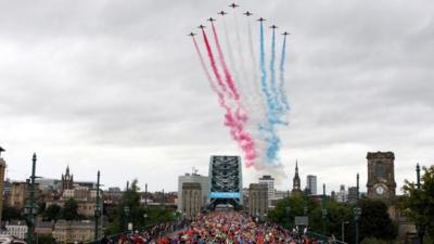 Athletes crossing the Tyne Bridge as they compete in the 2013 BUPA Great North Run in Newcastle.