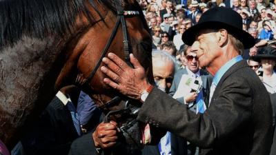 Trainer Henry Cecil greets Frankel after his victory in the Juddmonte International Stakes