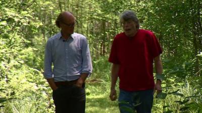 Will Gompertz and Stephen King walking through a wood