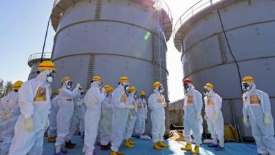 Japanese PM (in red helmet) at Fukushima nuclear plant