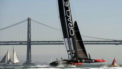 Oracle Team USA crosses the finish line ahead of Emirates Team New Zealand