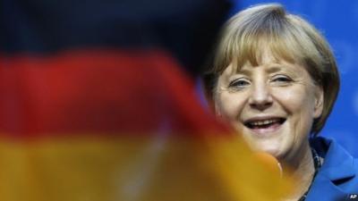 Angela Merkel and German flag