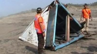 Part of boat on beach