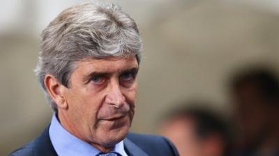 Manuel Pellegrini looks on after Bayern Munich defeat