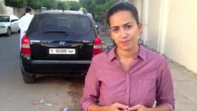 BBC reporter Rana Jawad outside Anas al-Liby's home in Tripoli